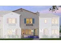 Modern two-story townhome with gray siding, blue shutters, and landscaping at 2660 S Equestrian Dr # 109, Gilbert, AZ 85295