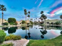 Luxury community with lakefront homes and lush landscaping at 10050 E Mountainview Lake Dr # 21, Scottsdale, AZ 85258