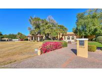 Beautiful two-story home with landscaped yard and driveway at 3816 E Minton Pl, Mesa, AZ 85215