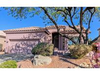 Single-story home with a two-car garage and desert landscaping at 3055 N Red Mtn Rd # 180, Mesa, AZ 85207