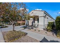 Single-story home with covered porch and landscaped yard at 10552 E Sebring Ave, Mesa, AZ 85212