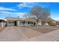 Charming single story home with a landscaped front yard at 1710 E 1St St, Mesa, AZ 85203
