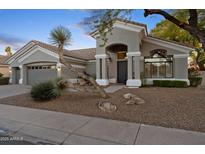 Single story home with attractive landscaping at 5403 E Cannon Dr, Paradise Valley, AZ 85253