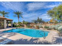 Inviting community pool with spa and waterfall feature at 1445 E Broadway Rd # 222, Tempe, AZ 85282