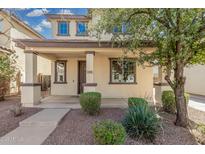 Charming two-story home with a covered front porch and well-maintained landscaping at 3451 E Tyson St, Gilbert, AZ 85295