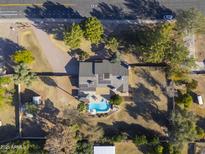 Aerial view showing home, pool, and expansive backyard at 4027 E Pueblo Ave, Mesa, AZ 85206