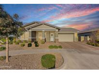 Attractive single-story home with landscaped front yard and two-car garage at 5622 S Tobin Ave, Mesa, AZ 85212