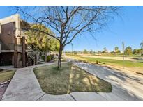 Condo with pathway to a scenic golf course at 7777 E Main St # 228, Scottsdale, AZ 85251