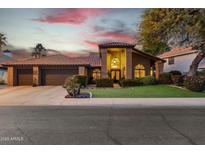 Attractive single-story home with a three-car garage and well-manicured lawn at 844 W Wagner Dr, Gilbert, AZ 85233