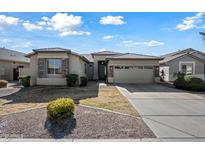 One-story house with stone accents and a two-car garage at 3383 E Santa Fe Ln, Gilbert, AZ 85297