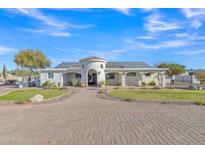 Stunning ranch home with solar panels and landscaped yard at 2344 N Raven --, Mesa, AZ 85207