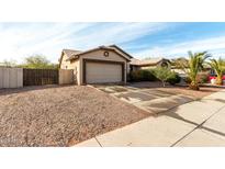 Single-story home with attached garage and desert landscaping at 4212 S 78Th Ln, Phoenix, AZ 85043