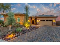 Stunning desert landscape surrounds this single-story home with a three-car garage at 6251 E Bramble Berry Ln, Cave Creek, AZ 85331