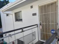 Exterior view of building, showing entrance and balcony at 720 N 82Nd St # E210, Scottsdale, AZ 85257