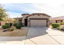 One-story house with desert landscaping and two-car garage at 157 W Latigo Cir, San Tan Valley, AZ 85143