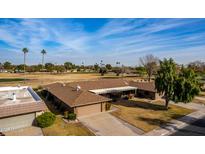 Aerial view of single-story home with golf course views at 17811 N Boswell Blvd, Sun City, AZ 85373