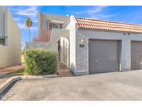 Spanish style condo with attached garage and gated entry at 2524 S El Paradiso Dr # 74, Mesa, AZ 85202