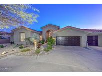 Stunning desert home with a three-car garage and mature landscaping at 12657 N 135Th St, Scottsdale, AZ 85259