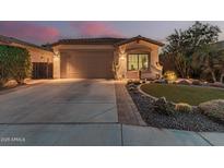 Well-maintained single-story home with a two-car garage and landscaped front yard at 337 W Stanley Ave, San Tan Valley, AZ 85140