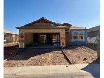 New construction home exterior, showing framing and landscaping underway at 5545 E Rock Bush Ln, San Tan Valley, AZ 85140