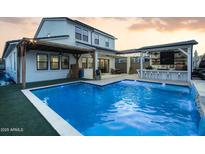 Stunning pool with outdoor kitchen and pergola at 19746 W Montecito Ave, Litchfield Park, AZ 85340