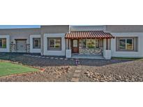 Single-story home with stucco exterior, tile roof, and landscaped front yard at 26314 N 114Th Ave, Peoria, AZ 85383