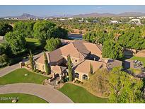 Luxury home with expansive grounds, mature trees, and a circular driveway at 4222 E Mclellan Cir # 7, Mesa, AZ 85205