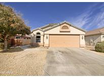 One-story house with a two-car garage and landscaped yard at 4350 E Longhorn St, San Tan Valley, AZ 85140