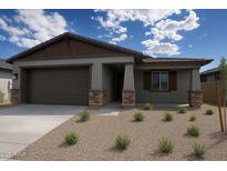 Charming single-story home featuring a two-car garage and low-maintenance desert landscaping at 22645 W Irma Ln, Surprise, AZ 85387
