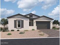 Single-story home with gray and white exterior, two-car garage, and landscaping at 22717 E Saddle Way, Queen Creek, AZ 85142