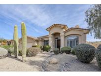 Single-story home with desert landscaping and two saguaro cacti at 17421 E Via Del Oro --, Fountain Hills, AZ 85268
