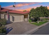 Attractive single-level home with a two-car garage and well-maintained landscaping at 5320 N 79Th Way, Scottsdale, AZ 85250