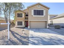Two-story house with a two-car garage and desert landscaping at 16649 W Polk St, Goodyear, AZ 85338