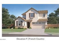 Two-story French Country home with stone accents and a three-car garage at 8238 E Petunia Ave, Mesa, AZ 85212