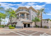 Upscale 3-story building with parking garage and landscaping at 3801 N Goldwater Blvd # 204, Scottsdale, AZ 85251