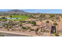 Aerial view of a house and golf course community at 6688 S Cartier Dr, Gilbert, AZ 85298