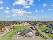 Aerial view of a ranch style home with expansive grounds, pool, and outbuildings at 9449 S 156Th Pl, Gilbert, AZ 85234