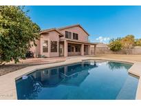 Home with a sparkling pool and spacious backyard at 1503 N Quail Ln, Gilbert, AZ 85233