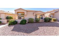 Single-story home with landscaped front yard and a well-maintained exterior at 18212 N 136Th Ave, Sun City West, AZ 85375