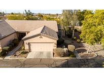 Single-story home with a 2-car garage and well-maintained landscaping at 846 N Pueblo Dr # 104, Casa Grande, AZ 85122