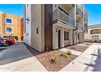 Modern building exterior with walkway and landscaping at 4220 N 32Nd St # 32, Phoenix, AZ 85018