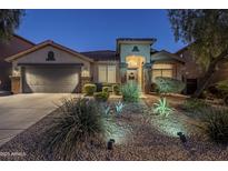 Attractive single-story home with landscaped front yard and two-car garage at 23219 N 41St St, Phoenix, AZ 85050