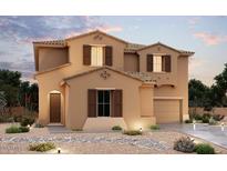 Two-story house with tan exterior, brown shutters, and a two-car garage at 10984 N 164Th Dr, Surprise, AZ 85388