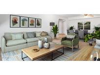 Comfortable living room features neutral tones, plush seating, and stylish decor at 3825 E Camelback Rd # 239, Phoenix, AZ 85018