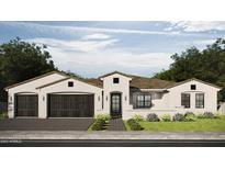 Craftsman style home with dark brown garage doors and landscaping at 8108 E Del Cristal Dr, Scottsdale, AZ 85258