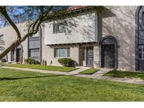 Updated 2-story townhome with front yard, walkway, and modern entry at 2968 E Clarendon Ave, Phoenix, AZ 85016