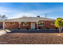 Brick house with a well-maintained front yard at 1061 W 5Th St, Mesa, AZ 85201