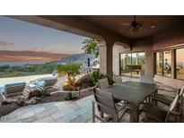 Covered patio with outdoor dining area and mountain views at 11510 E Mirasol Cir, Scottsdale, AZ 85255