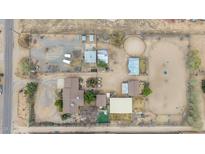 Spacious property featuring a horse arena, multiple structures, and ample land at 35011 N 3Rd St, Phoenix, AZ 85086
