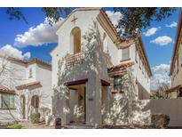 Charming two-story townhome with a red-tiled roof and a well-maintained stucco exterior at 5374 W Chisum Trl, Phoenix, AZ 85083
